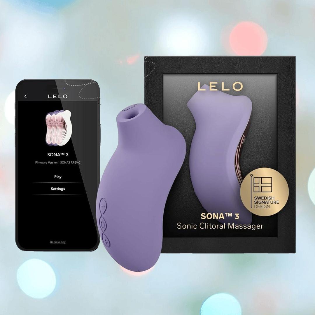 The LELO Sona 3 - Violet Dusk, featuring advanced SenSonic technology, is displayed beside its black packaging and a smartphone showing the app. The softly blurred pastel background enhances the scene. The LELO Sona 3 - Violet Dusk, featuring advanced SenSonic technology, is displayed beside its black packaging and a smartphone showing the app. The softly blurred pastel background enhances the scene.