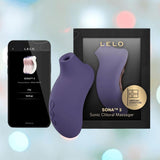 A LELO Sona 3 - Cyber Purple clitoral massager is shown beside its black and gold packaging and a smartphone displaying the LELO app controls. A LELO Sona 3 - Cyber Purple clitoral massager is shown beside its black and gold packaging and a smartphone displaying the LELO app controls.