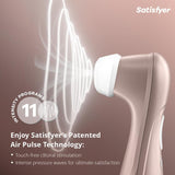 The Satisfyer Pro 2 Next Generation by Satisfyer, in rose gold, features touch-free clitoral stimulation with 11 intensity levels and a waterproof design, shown by white wavy lines symbolizing its patented pressure wave technology.