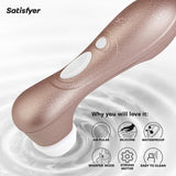 A close-up of the Satisfyer Pro 2 Next Generation by Satisfyer shows its bronze body with a white silicone tip above rippling water, featuring icons and text for pressure wave clitoris stimulation, waterproof design, whisper mode, strong motor, and easy cleaning.
