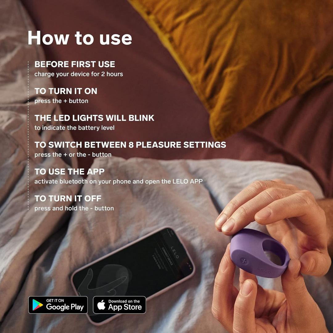 A person holds the LELO Tor 3 - Base Blue vibrating couples' ring made from body-safe silicone beside a smartphone on a bed. Overlay text gives usage instructions and highlights the LELO app, with Google Play and App Store logos shown.
