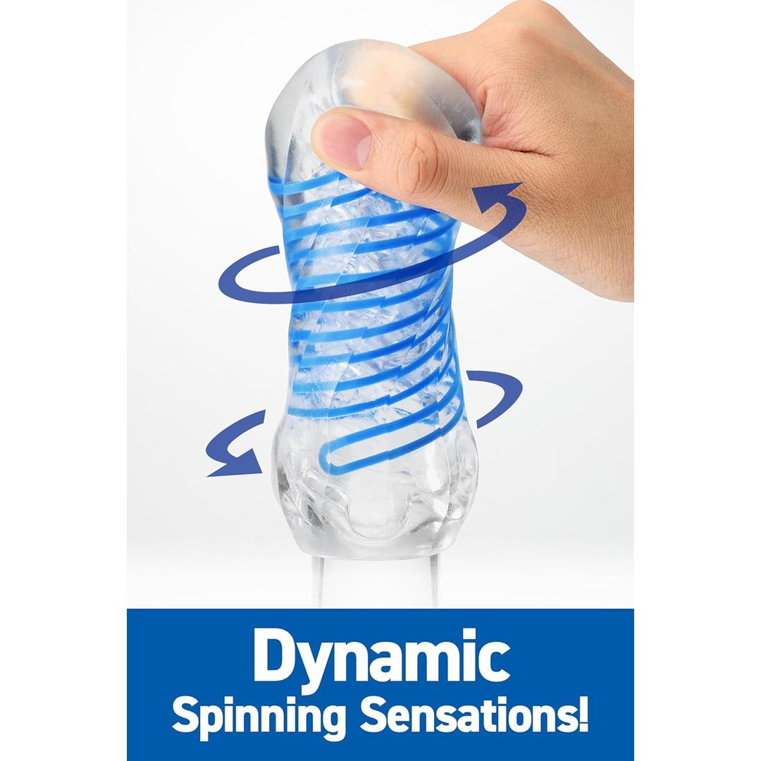 A hand squeezes the transparent, textured Tenga Spinner DX 01 Drops by Tenga, featuring blue spiral lines and a twisting motion. Text below reads: "Dynamic Spinning Sensations!" on a blue background.