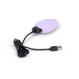 The Je Joue Mimi Deux Pebble Vibrator Lilac, designed in an egg shape with a dual-texture finish and connected by a black USB cable, is equipped with a low-frequency motor for superior performance.