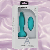 The A-Play Thrust Adventurous Rechargeable Plug in teal by Doc Johnson comes in white "A-Play" packaging and is shown with a wireless remote control against a light purple satin background.