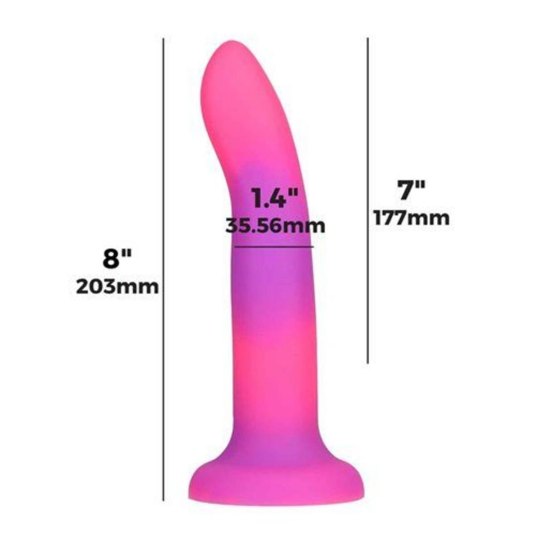 The BMS Addiction Rave Glow-in-the-Dark Bendable Vibrating Dong in pink and purple is made from premium silicone, harness compatible, has a flared base, 8" total length, 7" insertable, and 1.4" diameter.