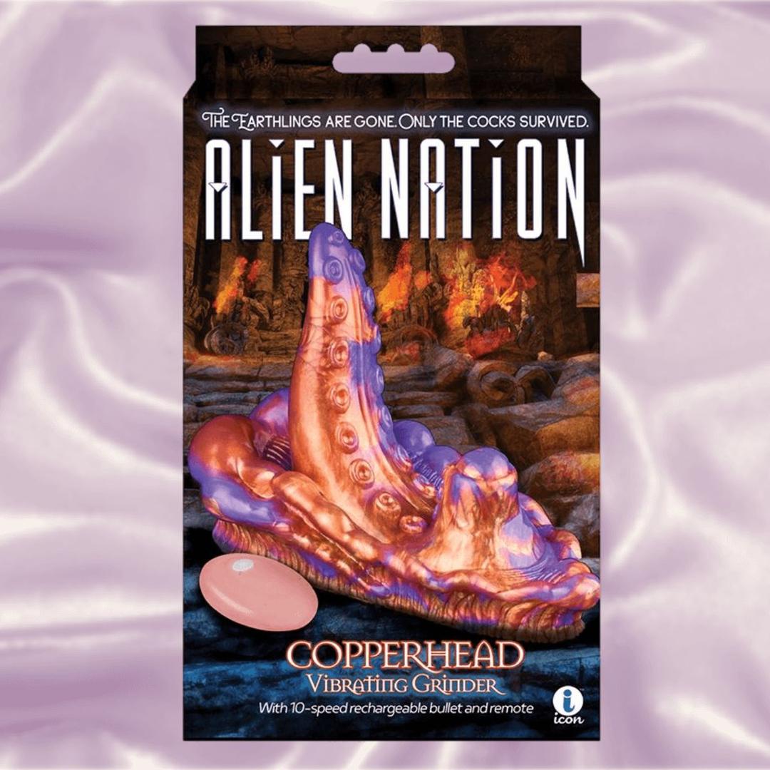 The Icon Brands Alien Nation Copperhead Grinder features a pink and orange tentacled fantasy design with a remote, set in an alien cave scene. This vibrating insertable from Icon Brands invites new sensations from another world.