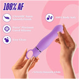 A person holds the Aria Rechargeable Vibe Exciting AF-Indigo by Blush Novelties on a pink background. Features: UltraSilk smooth finish, Puria platinum cured silicone, easy to clean, 100% body-safe, and velvety glide.