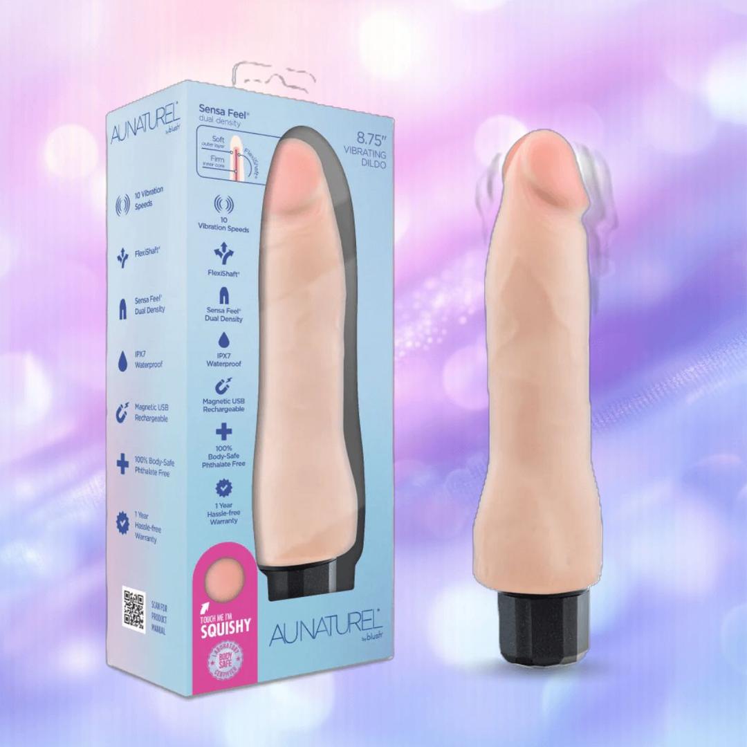 The Au Naturel Vanilla Ice Vibrating Dildo by Blush Novelties stands upright beside its box, showing features like "Sensa Feel," "10 vibration speeds," and "USB rechargeable." The purple background is accented with soft light effects.