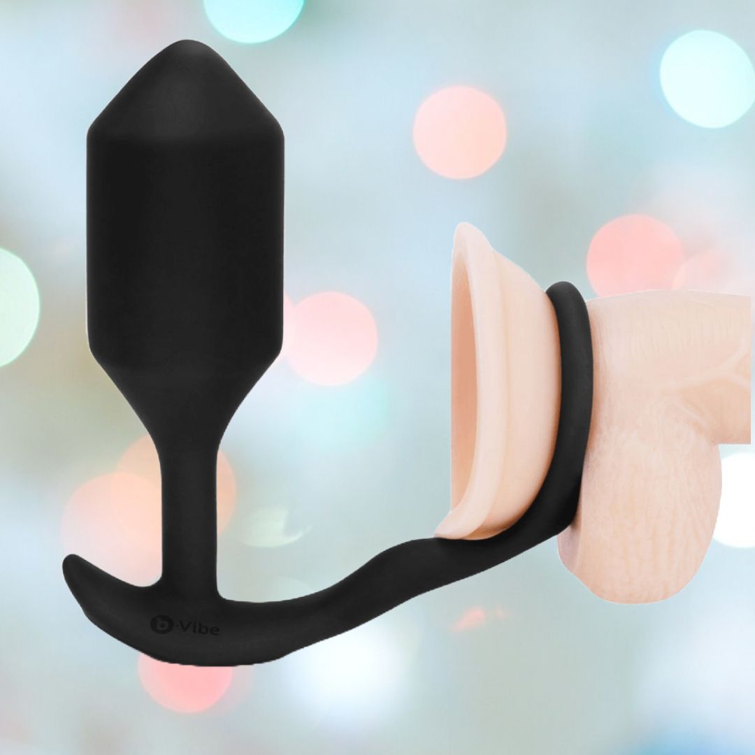 B-Vibe Snug & Tug Vibrating Cock Ring with Butt Plug XL Condomania.com B-Vibe Snug & Tug Vibrating Cock Ring with Butt Plug XL Condomania.com