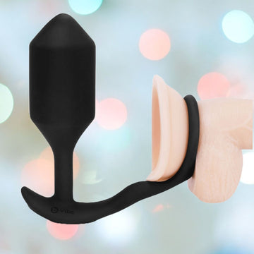 B-Vibe Snug & Tug Vibrating Cock Ring with Butt Plug XL Condomania.com B-Vibe Snug & Tug Vibrating Cock Ring with Butt Plug XL Condomania.com