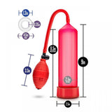 Introducing the Performance VX101 Enhancement Pump from Blush Novelties, a stylish red air pump that includes a bulb and 9-inch hose with a width of 1.3 inches. Standing at 8.5 inches tall with an internal diameter of 2 inches, this pump also features a maximum grip diameter of 4.5 inches to ensure optimal performance. Plus, it comes with a FREE Stay Hard Cock Ring for added value.