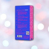 The image shows the back of a B Swish Bwild Classic Infinite Bunny - Pacific Blue box from Condomania.com with features like rechargeable, 8 vibration modes, waterproof, 2 motors, and body-safe silicone. The background has soft light spots.