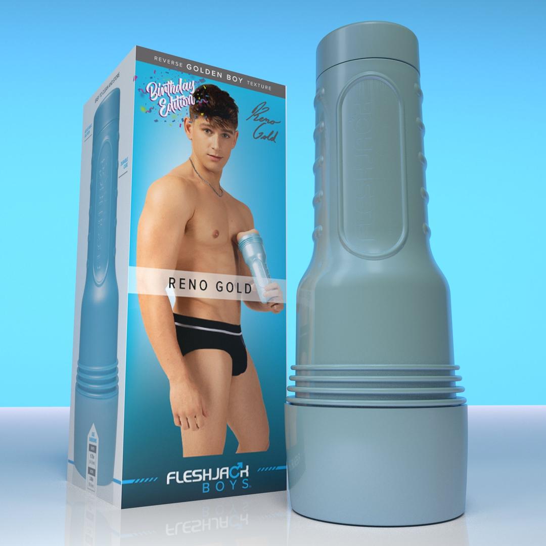 A cylindrical, blue Fleshjack Boys Reno Gold: Realistic Male Masturbator Cake Butt BIRTHDAY EDITION stands next to its retail box, which features a photo of a man in underwear and text reading “Birthday Edition.”