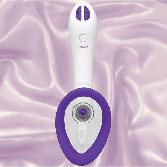 The Doc Johnson Bloom Rechargeable Intimate Body Pump - Purple is a white and purple handheld device with interchangeable cups, two buttons, and a central circular opening, shown on silky, light purple fabric. 1080