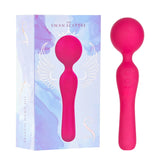 The Swan Sceptre Wand - Magenta by BMS is displayed beside its decorative box featuring blue, purple, and white wing designs with "The Swan Sceptre" text. Its body-safe construction combines style with peace of mind.