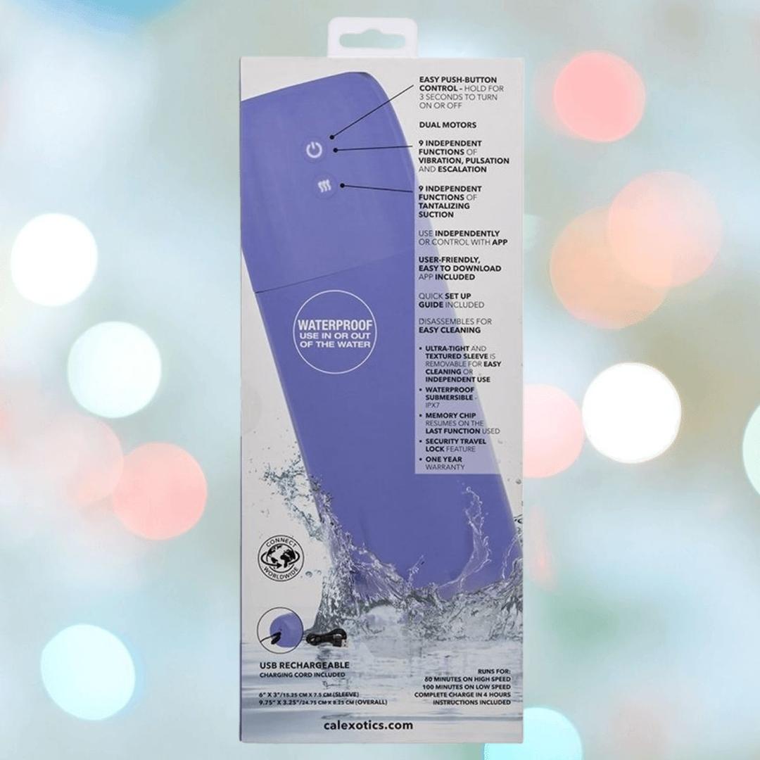 The back packaging of the CalExotics Connect Stroker with Vibration and Suction displays features like dual motors, USB rechargeability, and easy push-button control, set against a blurred background with colorful lights.