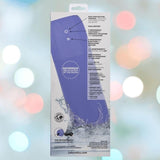 The back packaging of the CalExotics Connect Stroker with Vibration and Suction displays features like dual motors, USB rechargeability, and easy push-button control, set against a blurred background with colorful lights.