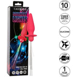 The CalExotics Southern Lights Vibrating Light Up Butt Plug Anal Vibrator Probe in pink is shown with its packaging. Features include 10 vibration functions, rechargeable silicone, travel lock, USB charging, and a 1-year warranty.