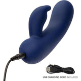 The CalExotics Cashmere Silk Bunny Rabbit Vibrator is a dark blue, curved silicone toy with a smaller extension, shown charging via USB. The included USB charging cord is separately displayed on a white background.