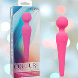 A pink Couture Collection Body Wand by CalExotics is displayed beside its packaging, which shows the massager and the product name. The background features soft pastel colors.