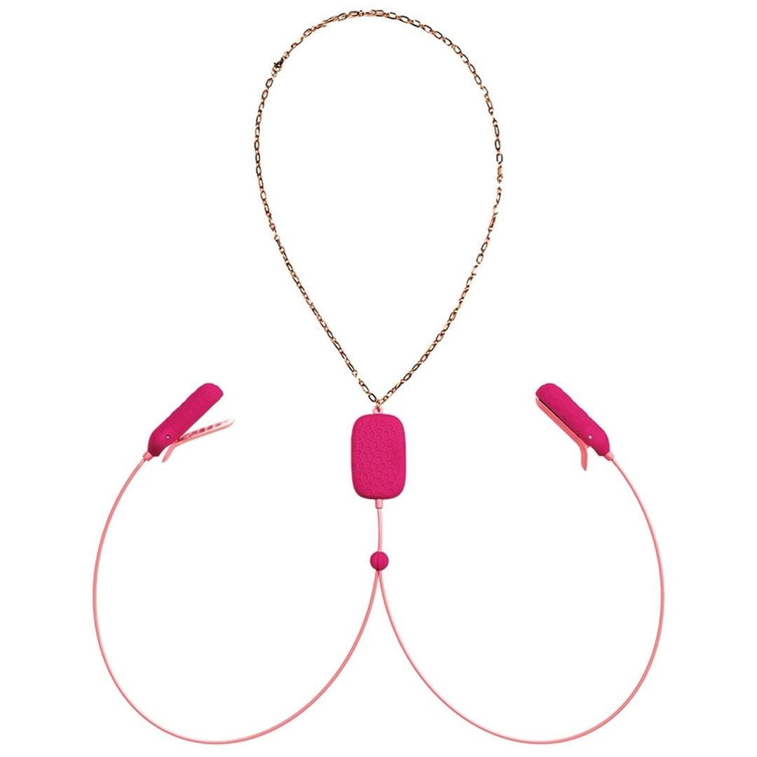 The OhMiBod Sphinx Bluetooth App-controlled Nipple Clamps in raspberry feature two vibrating clamps connected by a gold chain, with adjustable pink sliders and a central pink pad joining the cords.