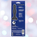 The image shows the back of a product box for CalExotics' Deep Swirl Reverberating Probe, a spiral-textured, waterproof vibrator made from body-safe silicone, with deep vibration features and branding on a blurred bokeh background.