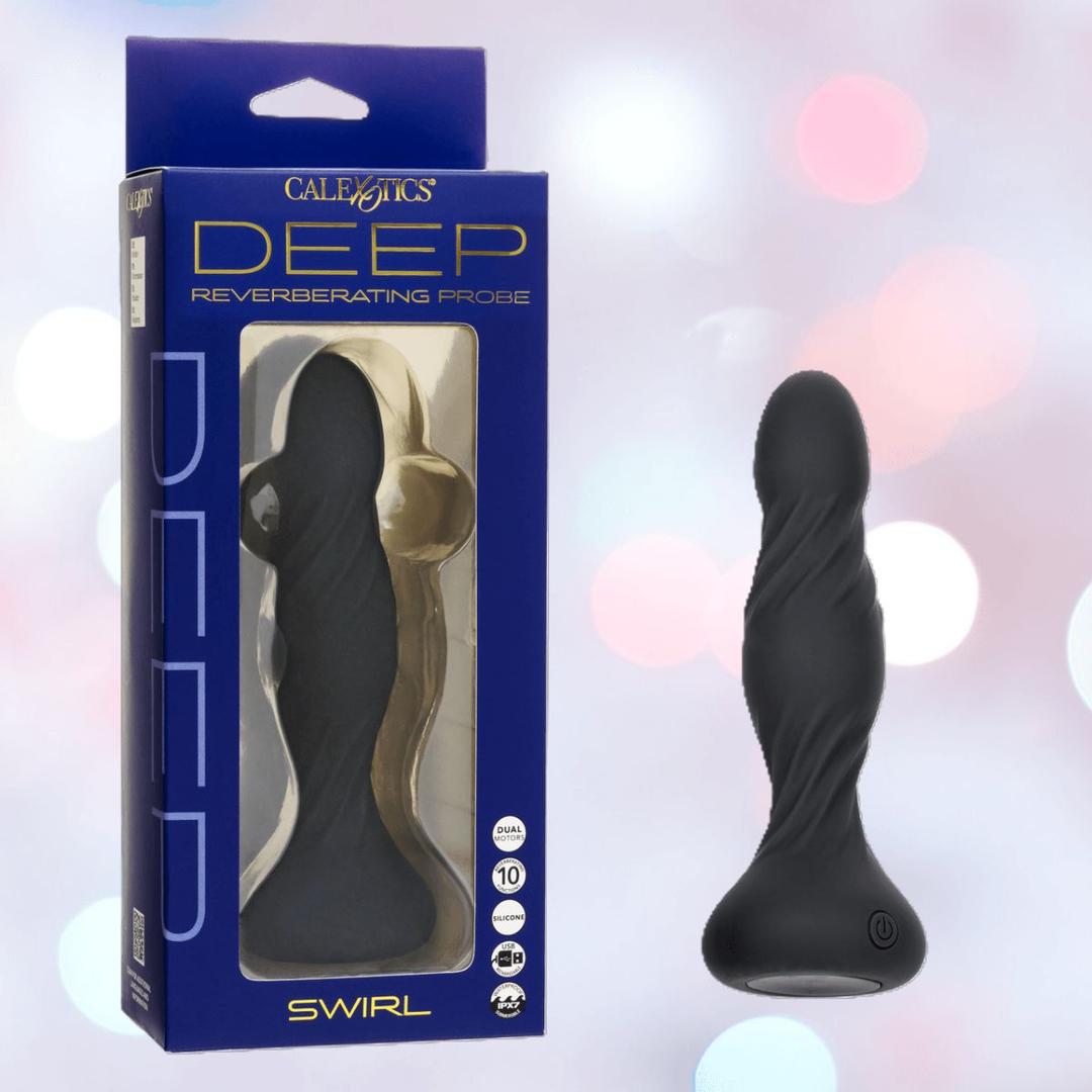 A black, spiral-textured silicone vibrator from CalExotics, the "Deep Swirl Reverberating Probe: Spiral-Textured Waterproof Vibrator," stands by its dark blue and gold box amid pastel lighting, highlighting its deep vibration feature.