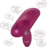 The CalExotics Dual Rider Remote Control Grinder is a purple, anatomically contoured vibrator with powerful vibrations, a removable thigh strap, compact design, comfortable for grinding, and includes a push-button remote for solo or partner use.