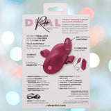 Product packaging for the CalExotics Dual Rider Remote Control Grinder highlights 12 vibration functions, compact design, adjustable strap, USB rechargeable battery, and remote control range information.