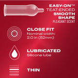 A condom diagram with text: “Easy-On™ teat-ended smooth shape, pleasant scent. Close fit: Nominal width 2.0 in (52mm). Lubricated: Silicone lube. Thin.” Red background featuring icons for fit, lubrication, and thinness. Perfectly showcasing Durex Extra Sensitive Thin “Close Fit” Condoms—Durex’s ultra-thin latex condoms designed for a close, sensitive fit and enhanced comfort.