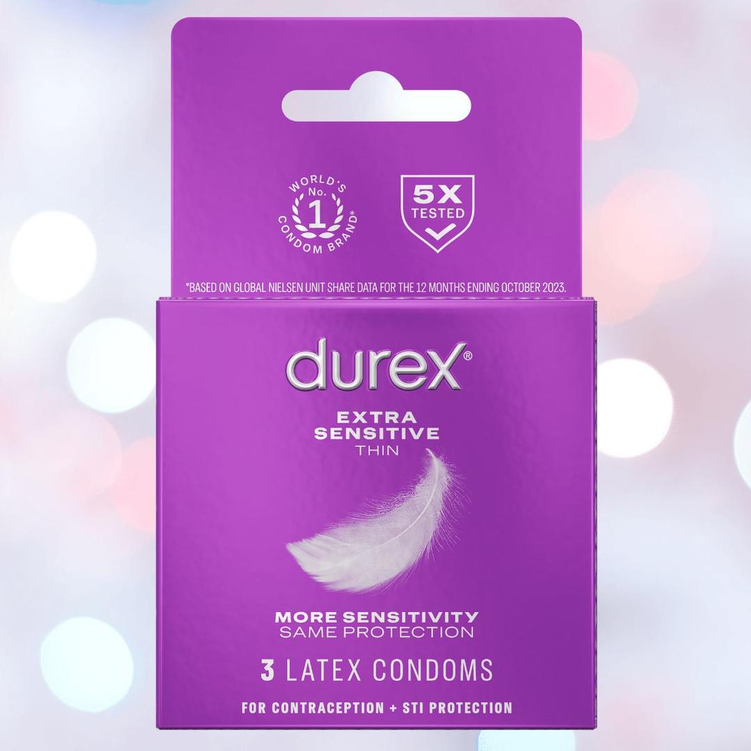 A purple box of Durex Extra Sensitive 'Thin' Condoms contains 3 natural rubber latex condoms with extra lubrication for heightened sensitivity, STI protection, feather graphic, and 5X tested for safety.