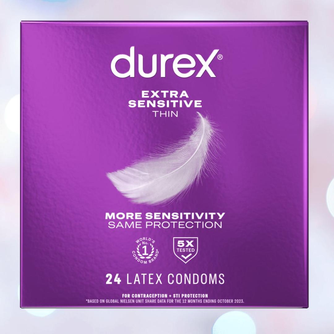 A purple box of Durex Extra Sensitive 'Thin' Condoms displays a white feather and the phrase “More Sensitivity, Same Protection.” The pack includes 24 latex condoms that are extra thin, lubricated, 5X tested, and from Durex.