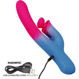 The Elation Thrusting Dual Stimulator Rabbit Vibrator by CalExotics, in blue and pink silicone, features a curved shaft and clitoral stimulator; shown charging with included magnetic USB cord.