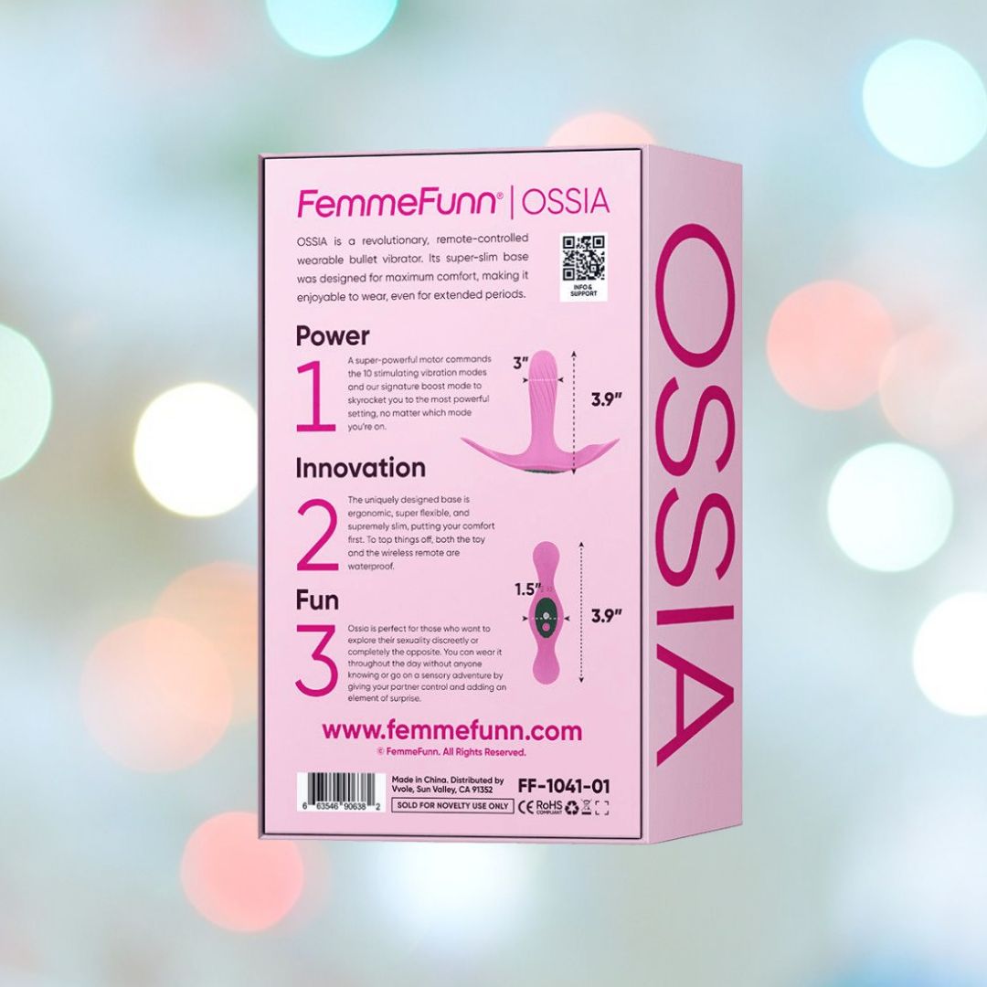 An image of the back of a product box for the Femme Funn Ossia Wearable Bullet Vibrator - Pink, highlighting its three key features: Power, Innovation, and Fun. The box is predominantly pink and white with text and graphics detailing the 10 vibration modes, specifications, usage instructions, and images of the product.

