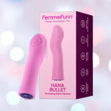 The Femme Funn Hana Thumping Bullet Vibrator in pink stands beside its box, featuring highlighted details. This waterproof silicone vibe is displayed on a soft pastel background with gentle circular light spots.