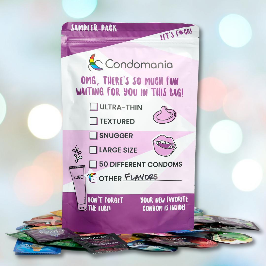 The Flavored Condom Sampler by Condomania offers 50 varieties from top brands, featuring ultra-thin, textured, snugger, and large sizes. The colorful design includes playful packs around the base with "Let’s F*ck!" text atop for a vivid multisensory experience.