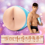 A shirtless man in black underwear holds a blue Fleshjack Boys Reno Gold: Realistic Male Masturbator Cake Butt by Fleshlight, with close-ups of its internal texture and cross-sectional sleeve. The pink and purple background glows with soft light spots.