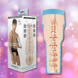 A product image displays the Fleshlight Fleshjack Boys Reno Gold: Realistic Male Masturbator Cake Butt next to its packaging, which features a shirtless man in black underwear. The toy's beige body with blue cap is set against a pink background with light bokeh effects.
