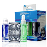 The Fleshlight Quickshot Vantage Value Pack by Fleshlight includes a clear masturbation sleeve, Fleshlube lube, and Fleshwash toy cleaner, with packaging in the background.