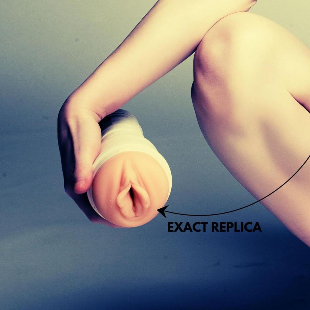 A person holding a condom, echoing the safe intimacy championed by Condomania.com and the lifelike SuperSkin feel of the Fleshlight Girls: Stoya Destroya.