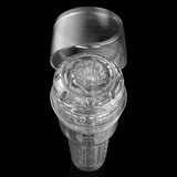 The Fleshlight GO Torque Portable Stroker by Fleshlight is a transparent, cylindrical male masturbation toy with a removable lid and intricate flower-like top design—perfect for travel, shown against a black background.