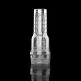 The Fleshlight GO Torque Portable Stroker Male Masturbation Toy by Fleshlight is a clear, cylindrical stroker with a textured interior, shown standing upright on a reflective black surface against a dark background.