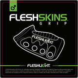 This illustration showcases the Fleshlight Fleshskins Grip Male Masturbator with Squeeze Control, a hand-held device by Fleshlight, crafted from Superskin material. Predominantly green and black, the image displays the logo and product name, with a distinctive green male symbol at the top left. Text below details trademarks and manufacturing specifics.