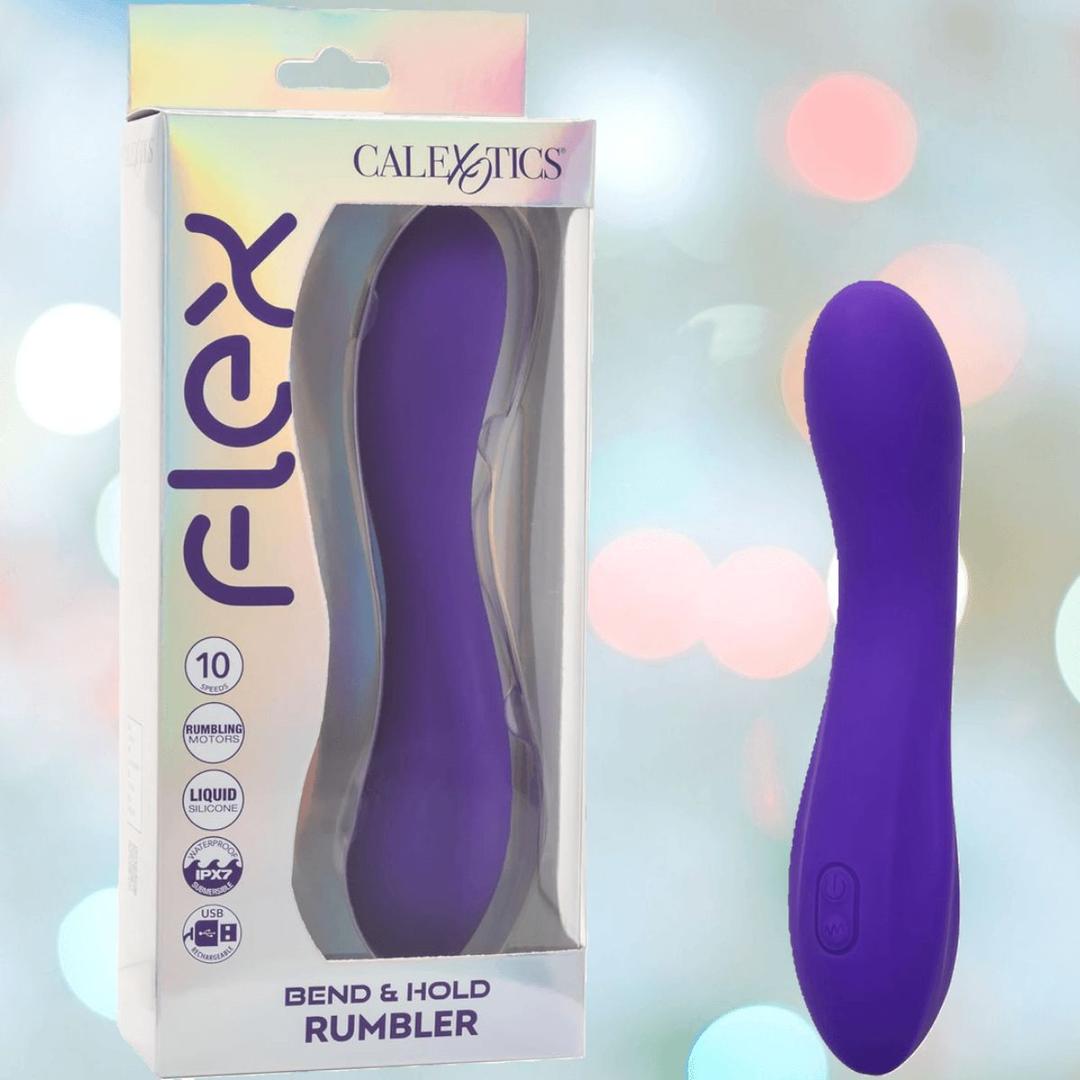 A purple CalExotics Flex Bend & Hold Rumbler G-Spot Stimulator is displayed beside its packaging, showcasing key features and a curved design against a soft, pastel-blurred background.