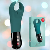 The product, the Fun Factory Manta Rechargeable Vibrating Male Stroker For Men in Deep Blue, features a black handle and control buttons. This intimate toy is displayed next to its packaging, which highlights an image and the brand name "Fun Factory." The backdrop includes a soft-focus bokeh effect.