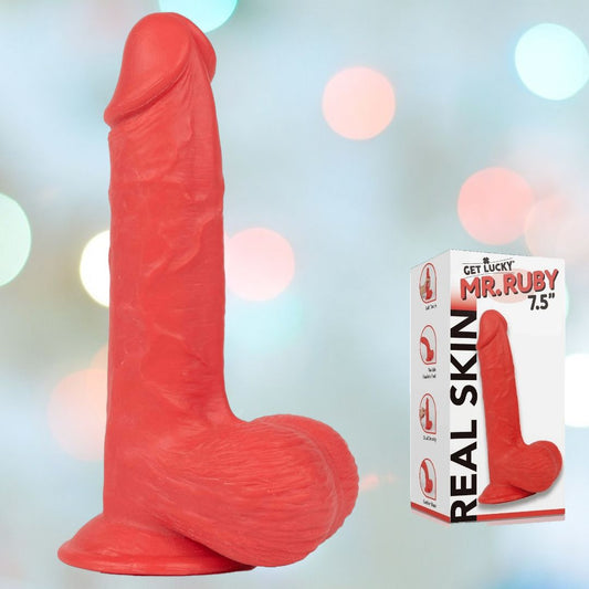 A red, realistic dildo featuring dual-density technology is shown next to a packaging labeled "Get Lucky Mr. Ruby 7.5" Realistic Dildo with Suction Cup." The product highlights include images and the text "Real Skin," set against a softly blurred background of vibrant lights. 1080