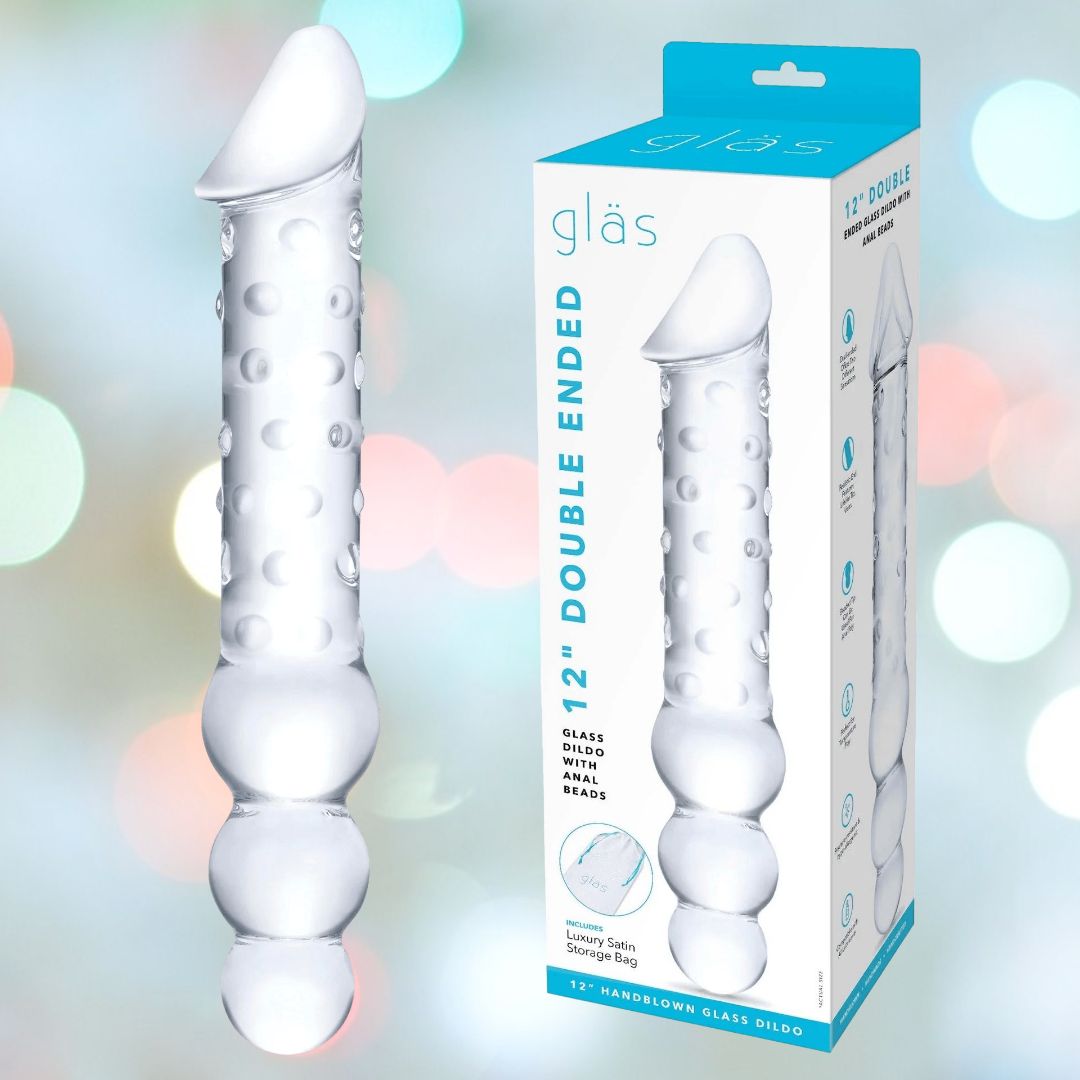 A Gläs 12" Double Ended Glass Dildo with Anal Beads, featuring a smooth design on one end and textured for temperature play on the other, is pictured next to packaging adorned with the brand name "Gläs" that highlights the product's enticing features.