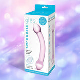 A retail box for the Gläs Double Trouble Purple Dildo by Gläs, a double ended glass toy for temperature play, is shown with product images and details on blue and white packaging against a blurred pastel background.