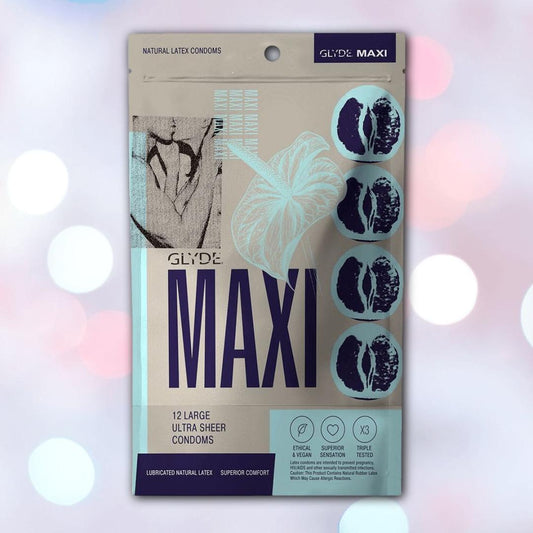 A package of Glyde Maxi LARGE Size Vegan Condoms by Glyde, made from natural latex and featuring artistic graphics that highlight ethical sourcing, superior comfort, and rigorous triple-testing on a soft pink and purple background. 1080