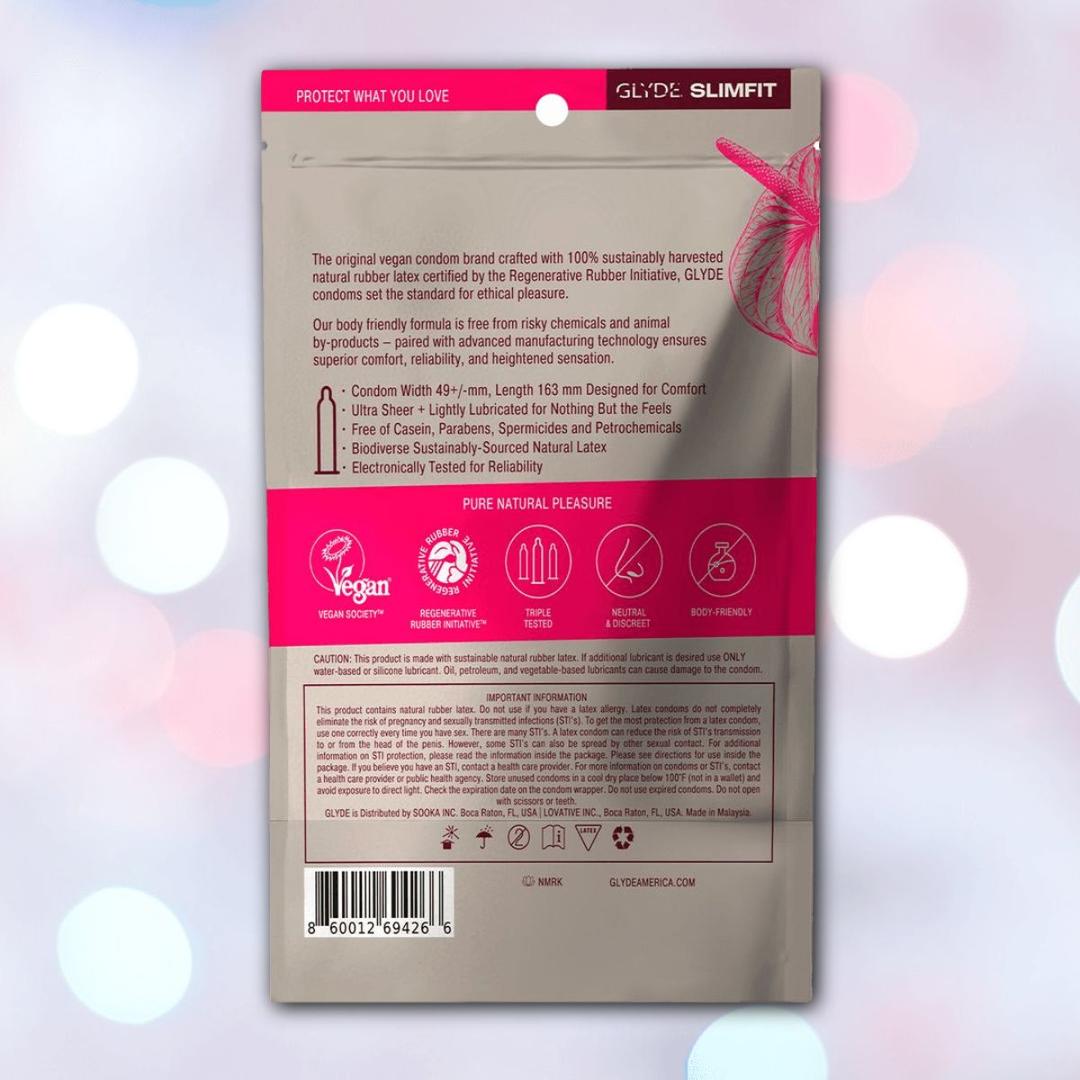 The gray package with pink accents features the Glyde SlimFit Small Size Condoms by Glyde, highlighting their vegan formula, certifications, key features, and ingredients. The packaging includes icons and a unicorn illustration in the top right corner.